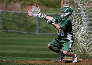 A lacrosse goalie making a save